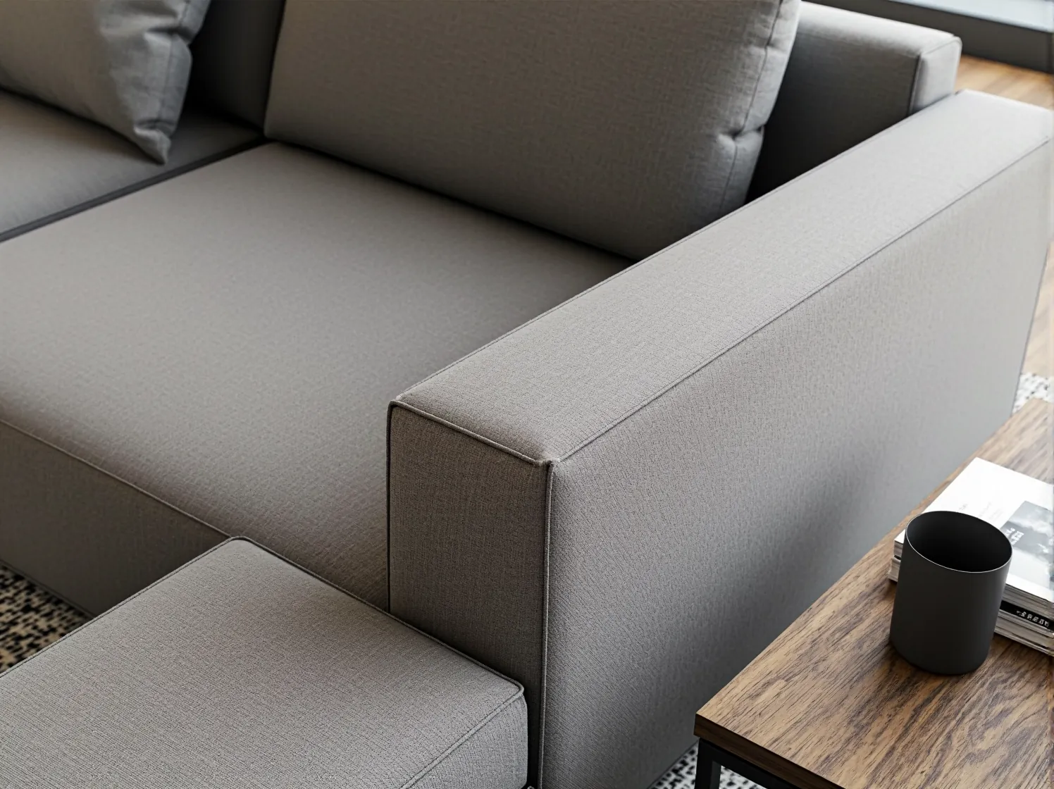 Nowoczesny narożnik tapicerowany w salonie - stylowy mebel z odpornego na plamy materiału.